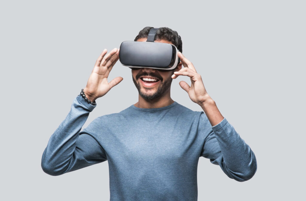 An adult with amblyopia uses a virtual reality headset as a part of their treatment plan.
