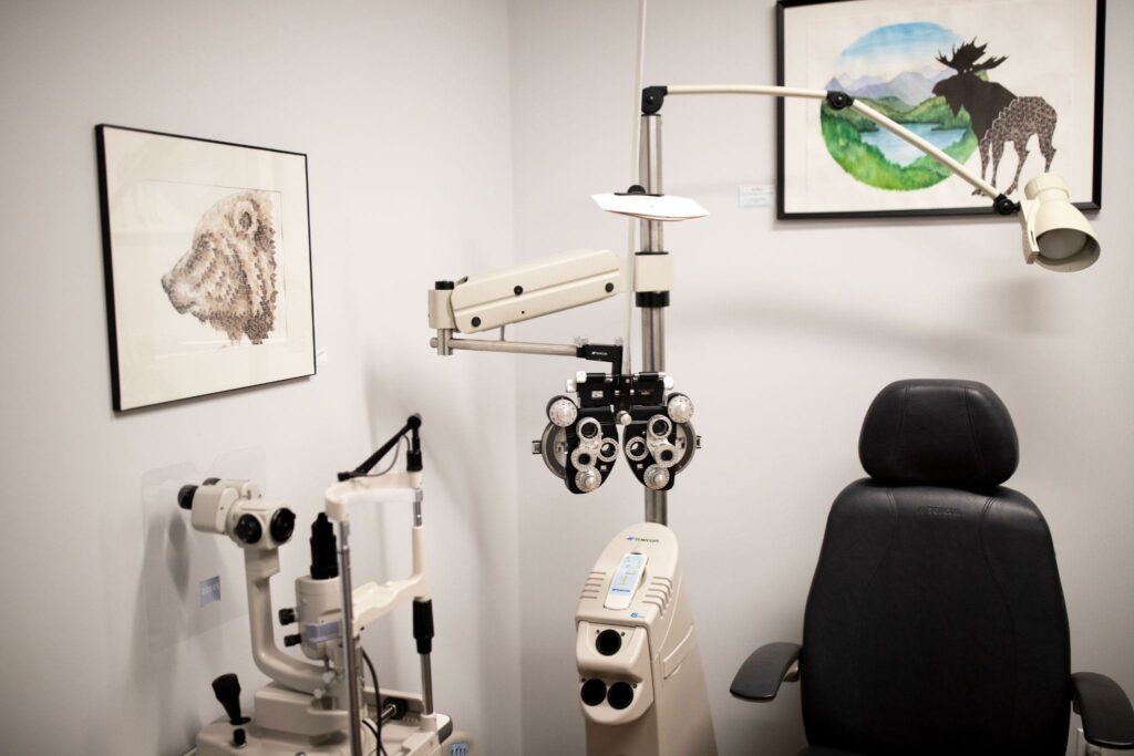 Inside of eye clinic where patients are getting an eye exam.